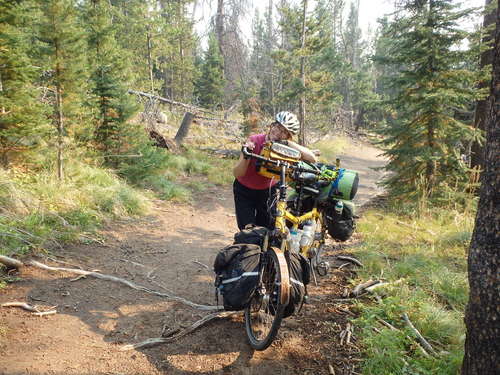 GDMBR: The process of moving gear and reloading the bike.